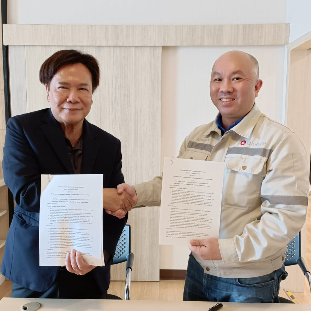 Sealing a Future of Sustainability: Mr. Adisorn V., CEO and Founder of Enereum Limited, and Dr. Kampon Sriwatanakul, Chairman of the Thailand National Charter of Health, shake hands on a promising collaboration, with a shared vision of fostering environmental wellness and advancing sustainable development.